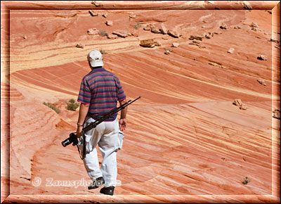 Fotograf auf dem Weg im Sand Cove